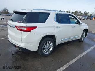 2018 Chevrolet Traverse High Country with VIN 1GNEVKKWXJJ237120, listed as a IAAI auction lot 41458312 with 125,626 mi miles. Bid and sale history available at carsss.com. Image 4.