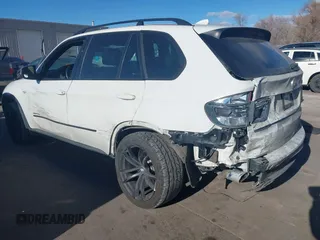 2012 BMW X5 35d with VIN 5UXZW0C56CL665631, listed as a IAAI auction lot 41055705 with 179,408 mi miles and . Bid and sale history available at DreamBid. Image 3.