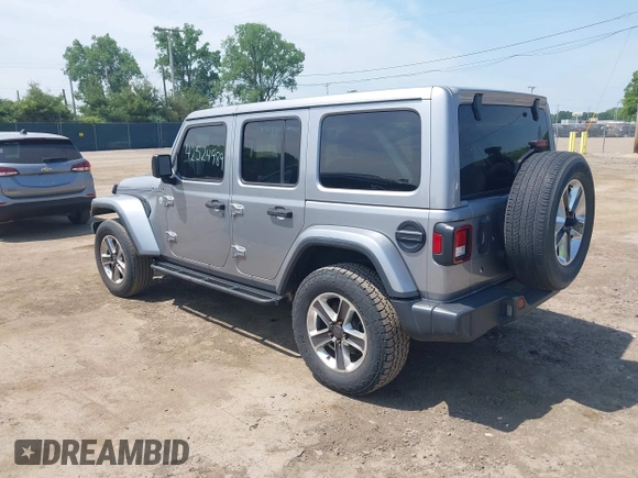 2019 Jeep Wrangler Unlimited Sahara with VIN 1C4HJXEN5KW542403, listed as a IAAI auction lot 42524989 with 60,451 mi miles and . Bid and sale history available at DreamBid. Image 3.