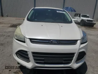 2013 Ford Escape SE z VIN 1FMCU0GX6DUD64499, wystawiony jako Copart lot #60971245 z przebiegiem 63 411 mil mil oraz Szkoda całkowita • Salvage title. Historia ofert i sprzedaży dostępna na DreamBid. Obrazek 5.