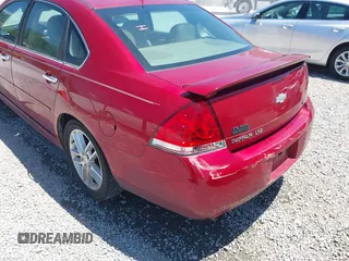 2013 Chevrolet Impala LTZ with VIN 2G1WC5E35D1175879, listed as a IAAI auction lot 42143602 with 156,385 mi miles and . Bid and sale history available at DreamBid. Image 6.