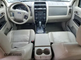 2010 Ford Escape Hybrid with VIN 1FMCU4K30AKC51022, listed as a Copart auction lot 51014615 with 128,275 mi miles and Salvage title. Bid and sale history available at DreamBid. Image 8.