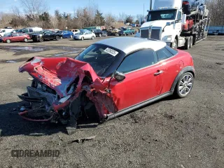2012 MINI Coupe S z VIN WMWSX3C54CT154692, wystawiony jako Copart lot #45290325 z przebiegiem Nie podano mil oraz Szkody całkowita. Historia ofert i sprzedaży dostępna na DreamBid. Obrazek 1.