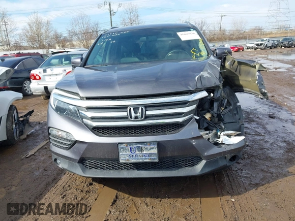 2017 Honda Pilot EX-L with VIN 5FNYF5H53HB029780, listed as a IAAI auction lot 41667838 with 104,803 mi miles. Bid and sale history available at carsss.com. Image 12.