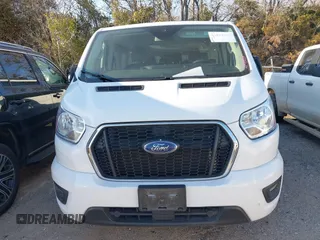 2021 Ford Transit Passenger XL z VIN 1FBAX2Y89MKA49850, wystawiony jako IAAI lot #41602893 z przebiegiem 74 248 mil mil oraz . Historia ofert i sprzedaży dostępna na DreamBid. Obrazek 12.