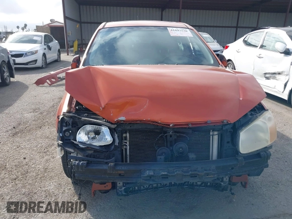 2007 Kia Spectra with VIN KNAFE161275003137, listed as a IAAI auction lot 41697530 with 256,834 mi miles. Bid and sale history available at carsss.com. Image 6.