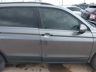 2021 Volkswagen Tiguan S with VIN 3VV0B7AX0MM017433, listed as a IAAI auction lot 42017125 with 54,624 mi miles and . Bid and sale history available at DreamBid. Image 14.