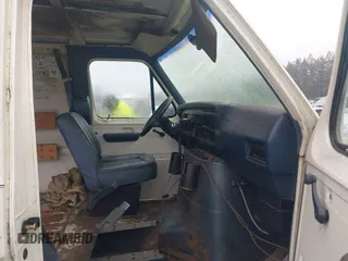 1990 Ford Econoline Cargo with VIN 1FTDE14N0LHA80405, listed as a IAAI auction lot 41824747 with 91,278 mi miles and . Bid and sale history available at DreamBid. Image 5.