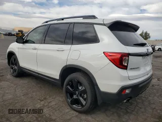 2021 Honda Passport Elite with VIN 5FNYF8H02MB039538, listed as a Copart auction lot 50265265 with 16,737 mi miles and Salvage Title. Bid and sale history available at carsss.com. Image 2.