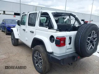 2025 Jeep Wrangler Sahara with VIN 1C4PJXEN1SW528297, listed as a IAAI auction lot 42131265 with 7,167 mi miles and . Bid and sale history available at DreamBid. Image 3.