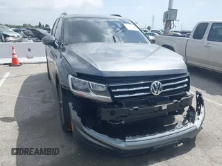 2020 Volkswagen Tiguan SE with VIN 3VV3B7AX9LM061569, listed as a IAAI auction lot 41902252 with 33,079 mi miles and . Bid and sale history available at DreamBid. Image 1.