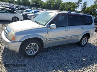 2004 Suzuki XL7 LX z VIN JS3TY92V144105911, wystawiony jako Copart lot #56744425 z przebiegiem 253 975 mil mil oraz Szkoda całkowita • Salvage title. Historia ofert i sprzedaży dostępna na DreamBid. Obrazek 1.