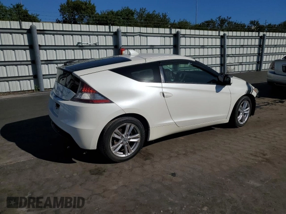 2011 Honda CR-Z with VIN JHMZF1D40BS000854, listed as a Copart auction lot 42409615 with 69,928 mi miles and Salvage Title. Bid and sale history available at DreamBid. Image 3.