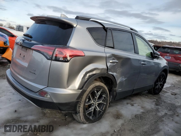 2018 Toyota RAV4 Hybrid SE z VIN JTMJJREV0JD246230, wystawiony jako Copart lot #89095135 z przebiegiem Nie podano mil oraz Szkoda całkowita • Salvage title. Historia ofert i sprzedaży dostępna na DreamBid. Obrazek 3.