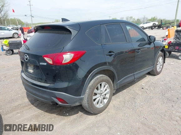 2016 Mazda CX-5 Sport with VIN JM3KE4BY8G0746377, listed as a IAAI auction lot 41990988 with 144,558 mi miles and . Bid and sale history available at carsss.com. Image 4.
