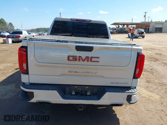 2020 GMC Sierra 1500 Denali z VIN 1GTU9FEL7LZ152659, wystawiony jako IAAI lot #41662492 z przebiegiem 101 222 mil mil oraz . Historia ofert i sprzedaży dostępna na DreamBid. Obrazek 16.