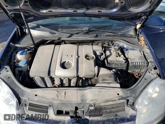 2007 Volkswagen Rabbit z VIN WVWDR71K77W167740, wystawiony jako Copart lot #42128275 z przebiegiem 254 695 mil mil oraz Szkoda całkowita • Salvage title. Historia ofert i sprzedaży dostępna na DreamBid. Obrazek 11.