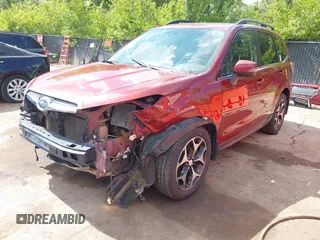 2014 Subaru Forester XT Touring with VIN JF2SJGMC9EH552996, listed as a IAAI auction lot 42540898 with 145,932 mi miles and . Bid and sale history available at DreamBid. Image 2.