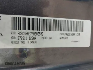 2015 Dodge Charger SXT with VIN 2C3CDXHG7FH886502, listed as a IAAI auction lot 42072027 with 105,034 mi miles and . Bid and sale history available at DreamBid. Image 9.