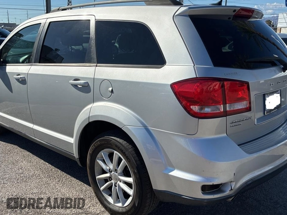 2013 Dodge Journey SXT with VIN 3C4PDDBG4DT593312, listed as a Copart auction lot 56431775 with 131,651 mi miles and Clean Title. Bid and sale history available at DreamBid. Image 3.