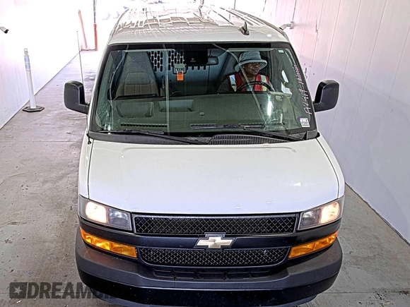 2021 Chevrolet Express Cargo with VIN 1GCWGAFP2M1303152, listed as a IAAI auction lot 42672934 with 68,671 mi miles and . Bid and sale history available at DreamBid. Image 9.