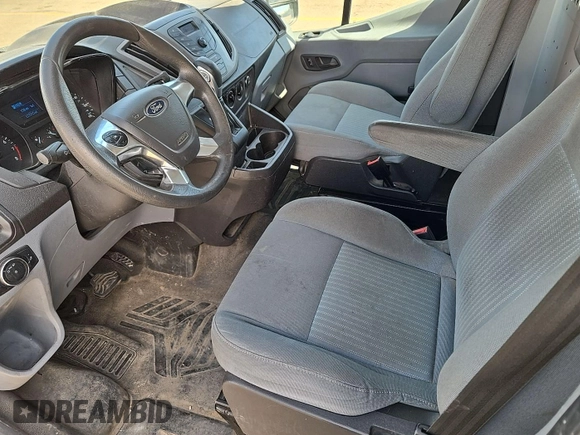 2015 Ford Transit Cargo with VIN 1FTNR1ZM9FKA47032, listed as a IAAI auction lot 42302028 with 127,215 mi miles and . Bid and sale history available at DreamBid. Image 23.