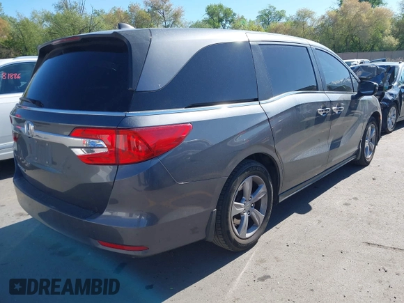 2018 Honda Odyssey EX-L z VIN 5FNRL6H7XJB067694, wystawiony jako IAAI lot #42177338 z przebiegiem 159 670 mil mil oraz . Historia ofert i sprzedaży dostępna na DreamBid. Obrazek 4.