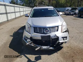 2014 Cadillac SRX Performance Collection z VIN 3GYFNCE38ES559239, wystawiony jako Copart lot #49843955 z przebiegiem 99 497 mil mil oraz Szkoda całkowita • Salvage title. Historia ofert i sprzedaży dostępna na DreamBid. Obrazek 5.
