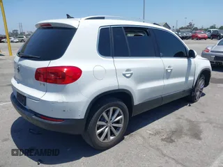 2017 Volkswagen Tiguan Wolfsburg Edition with VIN WVGRV7AX4HW502964, listed as a IAAI auction lot 42538054 with 104,530 mi miles and . Bid and sale history available at DreamBid. Image 4.