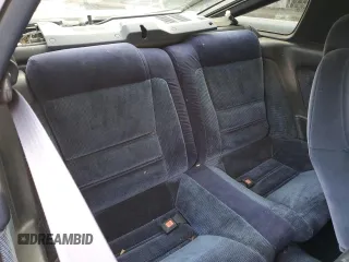 1987 Toyota Supra z VIN JT2MA70L2H0044216, wystawiony jako Copart lot #78864694 z przebiegiem 143 418 mil mil oraz Czysty tytuł • Clean title. Historia ofert i sprzedaży dostępna na DreamBid. Obrazek 10.