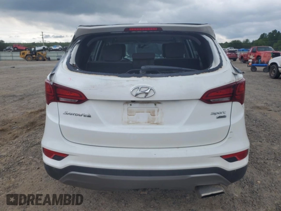 2017 Hyundai Santa Fe 2.4L z VIN 5XYZTDLB8HG429461, wystawiony jako Copart lot #53668375 z przebiegiem 97 447 mil mil oraz Czysty tytuł • Clean title. Historia ofert i sprzedaży dostępna na DreamBid. Obrazek 6.