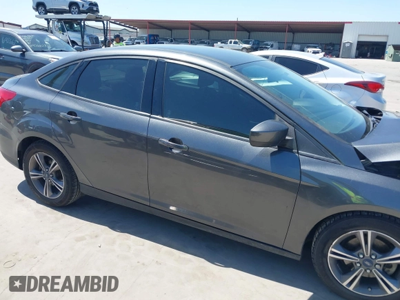 2018 Ford Focus SE with VIN 1FADP3FE3JL204220, listed as a IAAI auction lot 41972960 with 62,682 mi miles and . Bid and sale history available at DreamBid. Image 13.