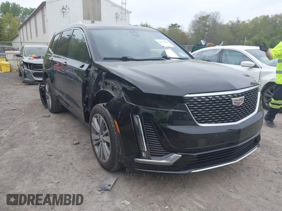 2022 Cadillac XT6 Premium Luxury with VIN 1GYKPDRS5NZ149971, listed as a IAAI auction lot 42259140 with 51,704 mi miles and . Bid and sale history available at DreamBid. Image 1.