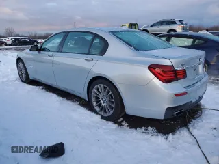 2014 BMW 7 Series 740Li xDrive with VIN WBAYF4C57ED281954, listed as a Copart auction lot 85297394 with 63,535 mi miles and Salvage Title. Bid and sale history available at carsss.com. Image 2.