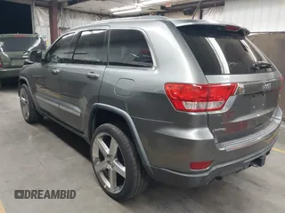 2013 Jeep Grand Cherokee Limited with VIN 1C4RJEBT9DC547491, listed as a IAAI auction lot 41969275 with 161,600 mi miles. Bid and sale history available at carsss.com. Image 3.