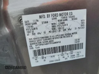 2007 Ford F-150 XLT z VIN 1FTPW14577FA46912, wystawiony jako Copart lot #64047995 z przebiegiem 140 452 mil mil oraz Szkoda całkowita • Salvage title. Historia ofert i sprzedaży dostępna na DreamBid. Obrazek 13.
