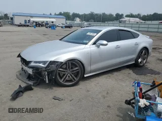 2015 Audi RS 7 с VIN WAUW2CFC5FN013049, выставлен на аукционе Copart как лот 57957093 с пробегом 95 826 миль миль и . История ставок и продаж доступна на DreamBid. Изображение 1.