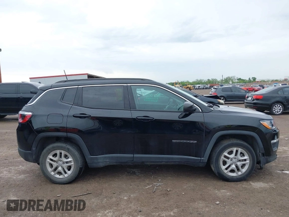 2019 Jeep Compass Sport z VIN 3C4NJCAB2KT848049, wystawiony jako IAAI lot #42119957 z przebiegiem 119 638 mil mil oraz . Historia ofert i sprzedaży dostępna na DreamBid. Obrazek 13.