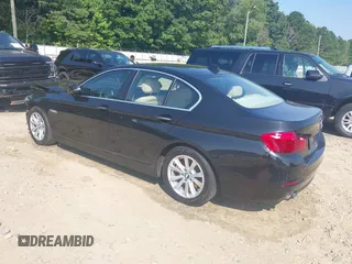 2015 BMW 5 Series 528i with VIN WBA5A5C52FD518794, listed as a IAAI auction lot 42571091 with 165,744 mi miles and . Bid and sale history available at DreamBid. Image 3.