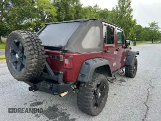 2007 Jeep Wrangler Unlimited X with VIN 1J8GA39147L156911, listed as a Copart auction lot 65987405 with 115,766 mi miles and Clean title. Bid and sale history available at DreamBid. Image 4.