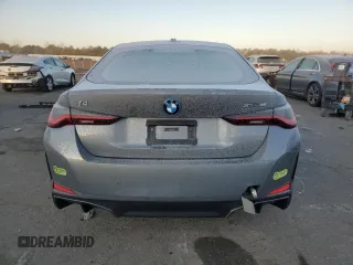 2024 BMW i4 xDrive40 z VIN WBY83FB05RFS82087, wystawiony jako Copart lot #41831225 z przebiegiem 1 396 mil mil oraz Szkoda całkowita • Salvage title. Historia ofert i sprzedaży dostępna na DreamBid. Obrazek 6.