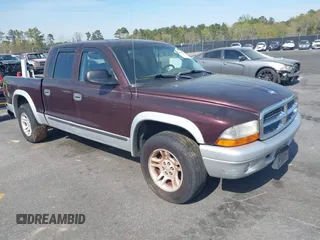 2004 Dodge Dakota SLT with VIN 1D7HL48N74S586018, listed as a IAAI auction lot 41910755 with 259,924 mi miles. Bid and sale history available at carsss.com. Image 1.