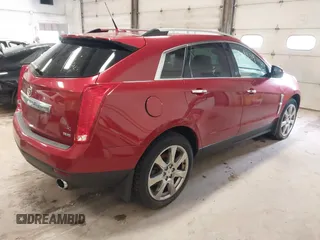 2012 Cadillac SRX Performance Collection with VIN 3GYFNEE36CS657582, listed as a IAAI auction lot 42084319 with 171,335 mi miles. Bid and sale history available at carsss.com. Image 4.