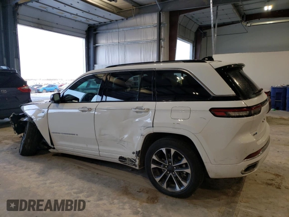 2022 Jeep Grand Cherokee Overland with VIN 1C4RJYD68N8716557, listed as a Copart auction lot 86807614 with 12,590 mi miles and Salvage title. Bid and sale history available at DreamBid. Image 2.