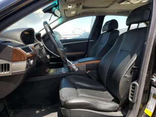 2007 BMW 7 Series 750i with VIN WBAHL83567DT08922, listed as a Copart auction lot 56196245 with 124,095 mi miles and Clean Title. Bid and sale history available at carsss.com. Image 7.