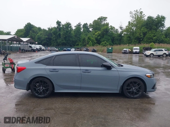 2023 Honda Civic Sport with VIN 2HGFE2F54PH512202, listed as a IAAI auction lot 42331949 with 44,568 mi miles and . Bid and sale history available at DreamBid. Image 13.
