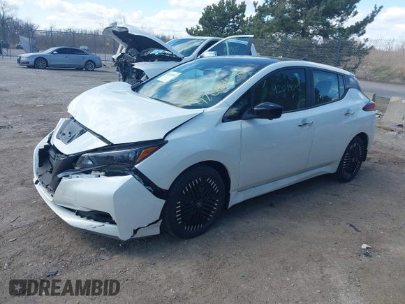 2023 Nissan LEAF SV Plus with VIN 1N4CZ1CV4PC557184, listed as a IAAI auction lot 42034042 with 12,037 mi miles and . Bid and sale history available at DreamBid. Image 2.
