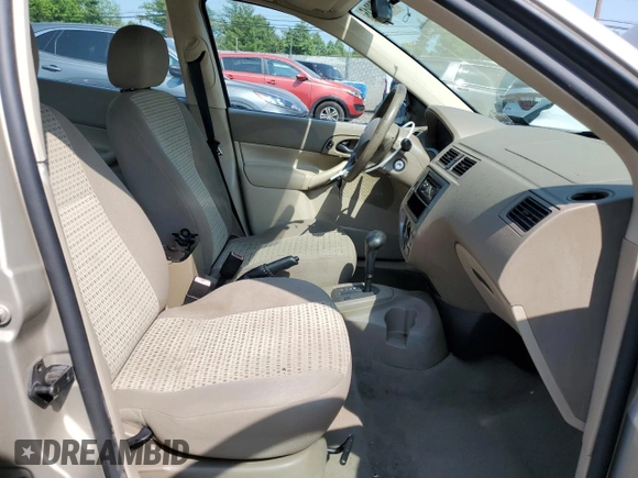 2006 Ford Focus S z VIN 1FAFP34N96W111431, wystawiony jako Copart lot #59478815 z przebiegiem Nie podano mil oraz Szkoda całkowita • Salvage title. Historia ofert i sprzedaży dostępna na DreamBid. Obrazek 7.