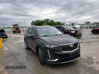 2023 Cadillac XT6 FWD Premium Luxury z VIN 1GYKPCRS5PZ101867, wystawiony jako Copart lot #51773545 z przebiegiem 31 322 mil mil oraz Szkoda całkowita • Salvage title. Historia ofert i sprzedaży dostępna na DreamBid. Obrazek 11.