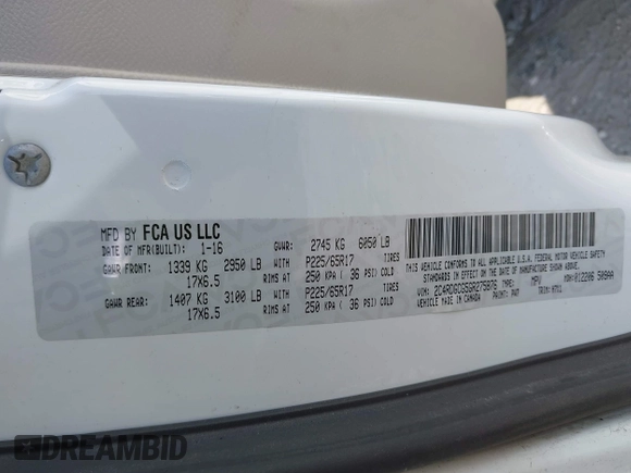 2016 Dodge Grand Caravan SXT with VIN 2C4RDGCG5GR275876, listed as a IAAI auction lot 42121344 with 140,652 mi miles. Bid and sale history available at carsss.com. Image 9.